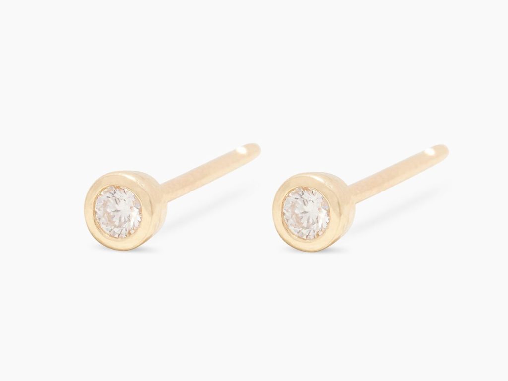 Golden stud earrings with diamonds