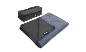 Blue and black YETI outdoor blanket